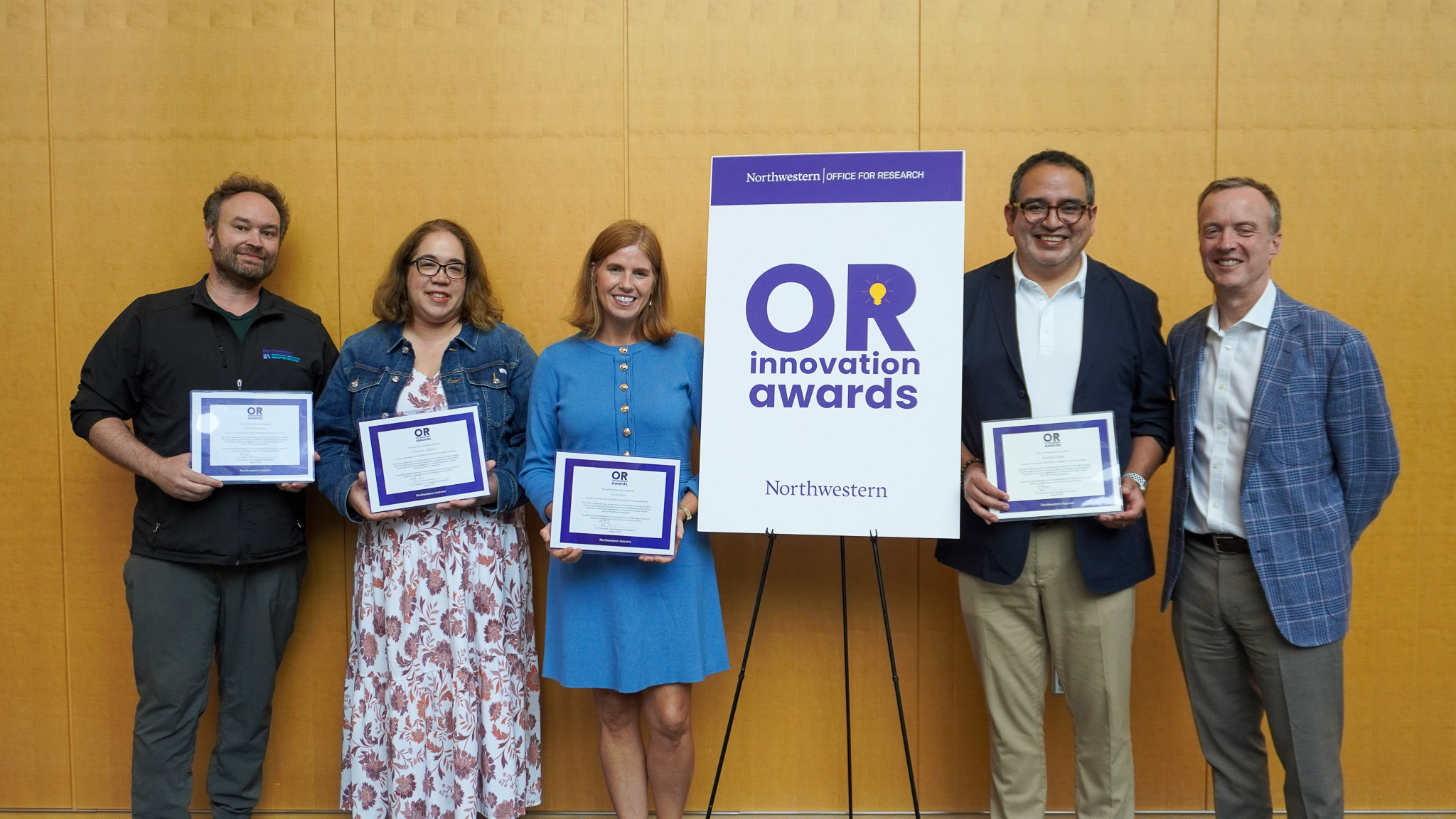 ORIA winners posing with Vice President for Research Eric Perreault