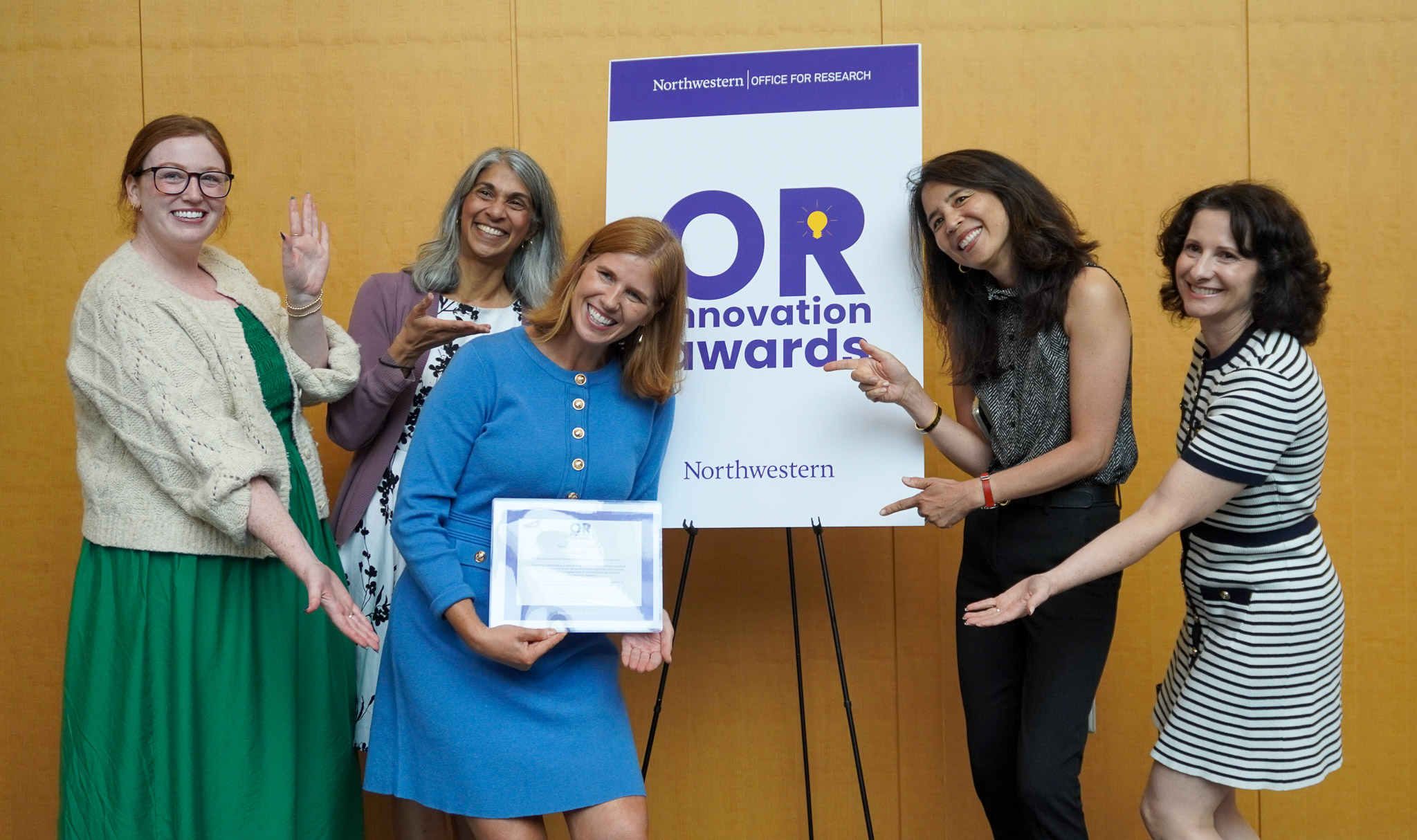 ORIA winner Sarah Stein (center left) with members of her team from the Innovation and New Ventures Office. 